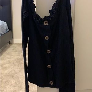 A black off the shoulder shirt